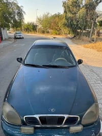 دايو لانوس باسمي سنوية ٢٧ كير محرك جيد $23$بيها شوية مجال 07774890733 ...
