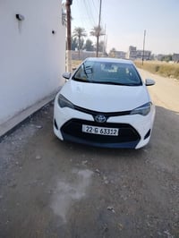 كورلا شمالي ابيض موديل 2019 وارد امريكي مكان السياره بغداد الدورة  077...