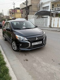 متسيوبيشي ميراجg4 موديل 2024بلاتينيوم ماشيه 27000 m فقط  رقم بغداد دول...