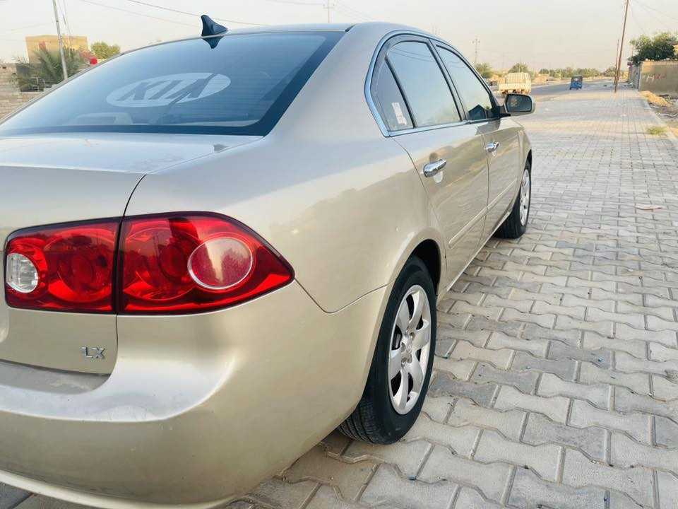 السلام عليكم
كيا اوبتما 2007وارد أمريكي بيهه قطعتين  جاملغ وبنيد صبغ بدون دواخل اثر شخط مكينه 2400

كير 5نمر رقم بغداد انكليزي السيارة ماشيه 180حقيقي السياره جديده بمعنى الكلمه 

السياره جاهزه مال جناي مكان السياره بابل السعر 98وبيهه مجال ***********

