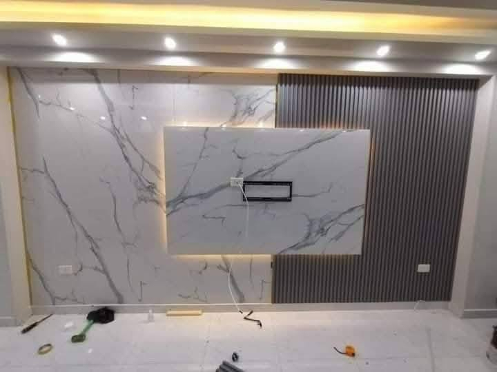 خلفه جبس بورد وجميع الديكورات والسقوف الثانوي والمعجون والصبغ ***********
