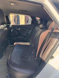 توسان ٢٠١٣ بغداد مكفولة عدا صبغ بقبق الجنطة وبارد بباب السكن ماشية ١٦٢...