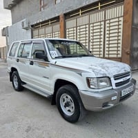 ايسوزو تروبر • ٢٠٠١ • دبل اكسل