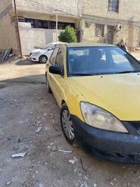 لانسر 2010بسمي شخصًا تحويل ثاني يوم سيارة استلمناها من الشركة عدنه مكا...