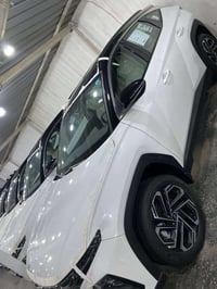 توسان 2025 زيرو مرقم بغداد لوحة وسنويه  الموصفات قماره ابيض  كشنات تبر...