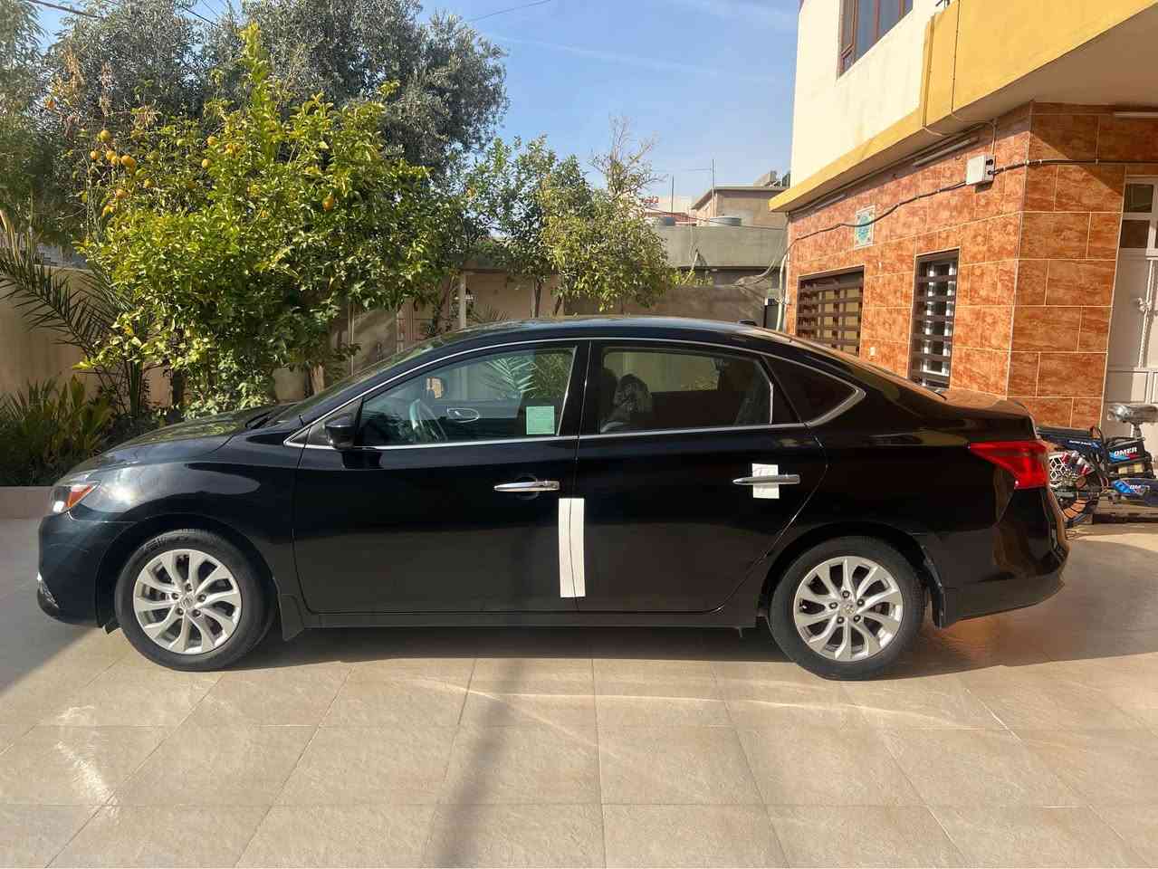 للبيع او مراوس نيسان سينترا ٢٠١٨ sv  بصمة باب بصمة شاشة و كاميرة بلادي تبريد لمس تحكمات ستيرن ماشية ٩٠الف كيلومتر بس بونيت صبخ بدون دواخل بدون ارباك رقم سنوية جديد كير محرك كهربائي كلشي بشرط مامفتوح علي وضع بلادي مكاني كركوك قادسية ٢ سعر ١٢١ بيها مجال  رقم موبايل *********** كركوك, العراق
