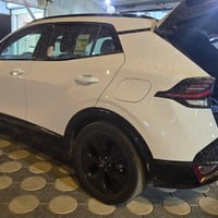 كيا سبورتج 2025 بلاكدشن اللون ابيض ماشيه 12 الف رقم بغداد الجديد  السع...