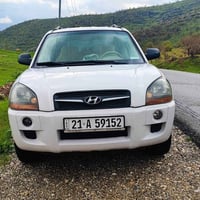 هيونداي توسان 2010 ماشية 198 ألف كم بلا صبغ وكل شغلها شرط المكينة وكال...