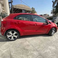 كيا ريو خليجي موديل2013 بيها 3 قطع صبغ رقم اربيل ماشية 95الف حقيقي وبي...