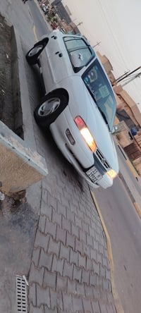 موديل 1996 رقم بغداد.....  مشروع وطني بسمي هزه جديده .. كير اتو ماتيك ...