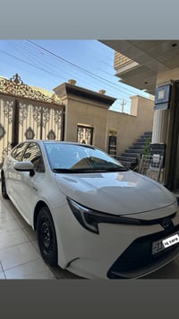 كورلا هايبرد  موديل 2024 ماشيه 50 الف كيلو متر   فول مواصفات   كشن جلد...