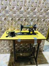 مكينة خياطة • شغالة • نجف