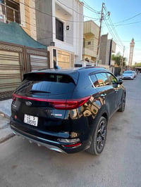 للبيع كيا سبورتج موديل ٢٠٢١ لون اسود مرقم بغداد انكليزي باسمي  وارد ام...