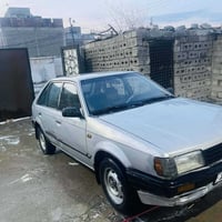 مازدا ٣٢٣ • مكينة وكير • شرط