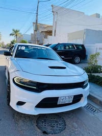 جارجر موديل 19 اصل بيه قطعتي صبغ تو ويل ماشيه 84 حقيقي سياره كير ومكين...