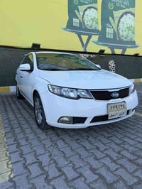 سيراتو ٢٠١١ خليجي نص فول محرك ١٦٠٠ دوش داخل اسود رياضي مخيط باحمر تبري...