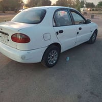دايو لانوس موديل 1997 مكينه كير عادي تبريد ثلج  رقم بغداد مشروع وطني م...