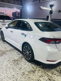 كورلا خليجي رقم بغداد 2020 محرك 2000   بيها مجال 157$ 07711448787