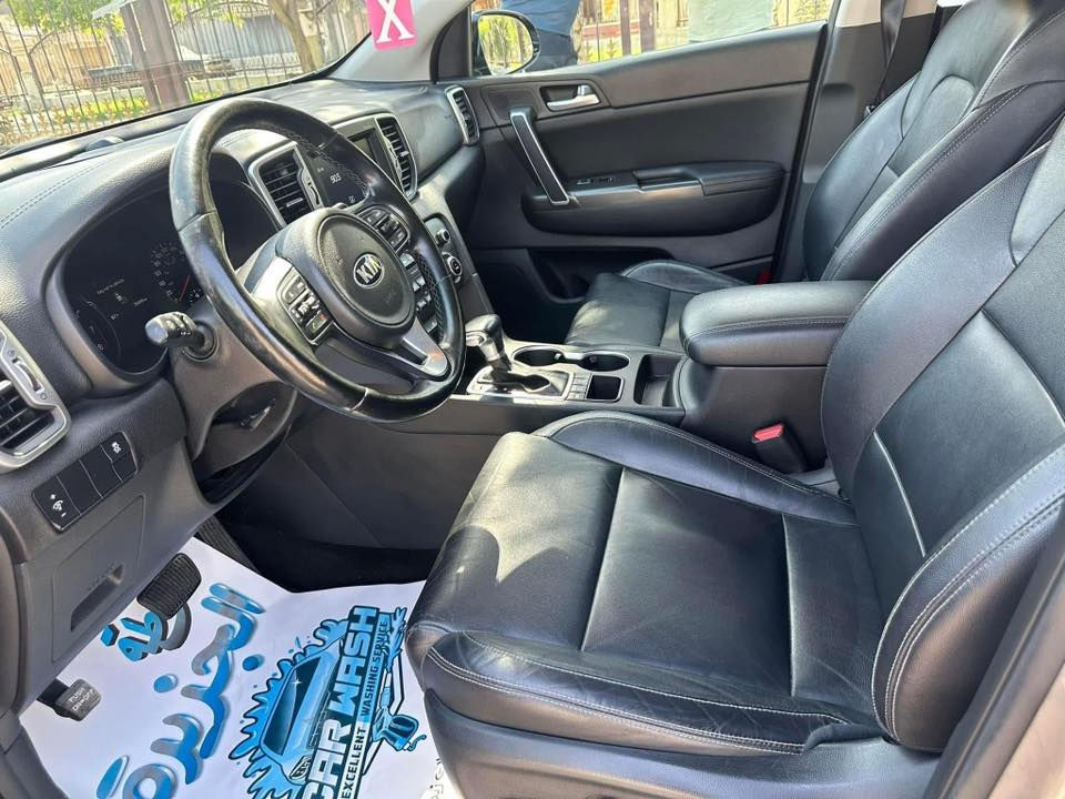 السعر 155 قفل
السلام عليكم سبورتج كندي للبيع 
موديل 2018 
فول مواصفات عده الفتحه EX
تشغيل عن بعد 
بصمه ابواب وبصمه تشغيل 
مري شفط واشاير بل مري 
كامره خلفيه وكامره دواره 
كشنات تدفأه تبريد وكشن كهرباء 
شاشه كبيره 
كامرات حوادث داش كام امامي خلفي داخلي
تلث وضعيات قياده وكروز سرعه 
كشنات جلد 
ماسحات اوتو ولايت اوتو 
رقم بغداد الجديد والسنويه جديده 
تبريد قطعتين وتبريد منفصل 
حادث السياره بدون تبديل وبدون صبغ 
فقط جاملغ بارد وشويه من البنيد 
السياره ماشيه 89كيلو مو ميل 
نضيفه وما ناقصها شي وكامله 
مكاني بغداد  
اني مكلف بل نشر للتفاصيل اكثر 
رقم صاحب السياره *********** ☎️ 
متواجد وات ساب
