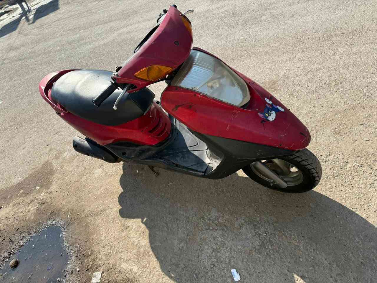 دراجه بريز خير من الله بس دشبول مكسور تايرات جديدة برغي ممفتوح بيها نكرة سلف كهربائيات كلها شغالة كابريتر مكينة خرسة افحص وأخذ  بغداد شارع النضال  *********** ( 600 )
