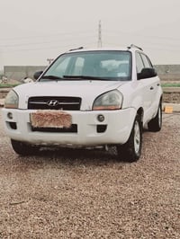 للبيع أو أمراوس  توكسان ٢٠٠٩ بغداد خليجي ستة سلندر محرك ٢٧٠٠ مكفولة من...