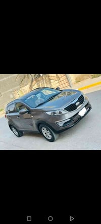 كيا سبورتج خليجي موديل ١٤ السياره بيها مكانات صبغ رقم ذي قار سنويه لل٣...
