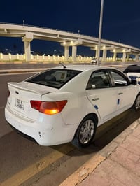 سيراتو خليجي 2012خمس قطع صبغ ابيعك حزام كفاله كير محرك تبريد  زوج تاير...