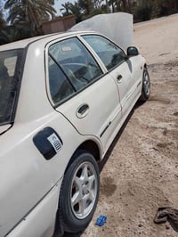 لبيع سياره بروتون 2004 كايمه بس تمشي  السياره بدون بدون  07724667290