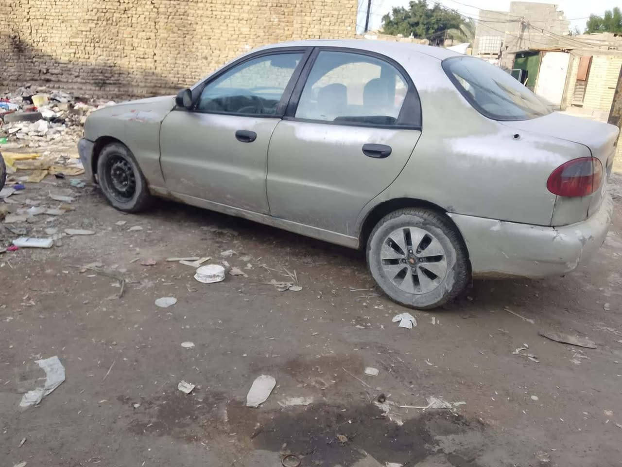 السلام عليكم سيارة دايو لاونوس موديل ٩٨بغداد  لأمين الثانيه سعره ٢٣ورقه رقم الهاتف ***********
