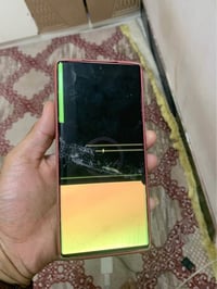 نوت ٢٠ الترا • شاشة مكسورة • كومة حديد