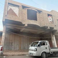 بناية ملك • ٩٣م • محلات ٢