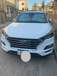 …. توسان موديل 2019خليجي لون ابيض محرك 2000 دوش فول عدا الفتحه بيها قط...