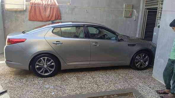 السلام عليكم كيا اوبتيما 12 وارد امريكي فول مواصفات رقم بغداد انكليزي باسمي أعلى فئه واحد على واحد كير محرك تبريد تخم كهربائيات كلها مكفوله حداديه تخم تاير بيها قطعه وحده صبغ جاملغ خلفي وثلاث قطع كلير فقط بدون حادث سيارة احلى من الصور العنوان بغداد رقم الهاتف ***********/بي واتساب السعر 110/وبيها مجال بسيط
