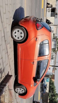 عندي جيلي باندا لون مشمشي موديل ٢٠١٣  سيارة نظيفة مكينه وكير وتبريد وك...