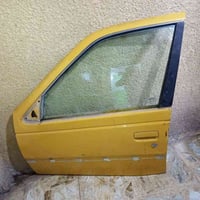 عندي باب سياره بيجو بارس بلاديه بس اشويه مبوطه مع الجامه والمكينة الجا...