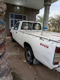 نيسان موديل 2002 رقم بابل عنوان بغداد الطارميه.   07878040428