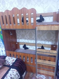 جربايه أطفال طابقين • خشب وصاج • السفحه