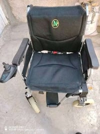 كرسي كهربائي • بدون بطارية • عرض ٥٦سم