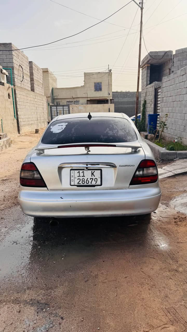 دايو لكنزه 2001 سياره محوره كير وحرك كورلا بيكاتشو سياره جاهزه كهربائيات شغاله حداديه حلوه. ب اسمي رقم انكليزي  مصبوغه عام حمليه والبدي شوف العين دواخله نضيفه السعر37. وبيه مجال قليل. بيع  أو مراوس حسب القناعه  للتواصل *********** ابو الخصيب, البصرة
