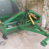 آلة جمع الحجارة • أرض زراعية • متوفر