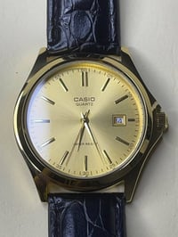 كاسيو MTP-1183Q-9A • كوارتز ياباني • جلد طبيعي