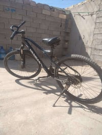 دراجة • بدل • لابتوب