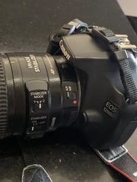 كانون D1200 • عدسة دبل ستاب • وياها شاحن