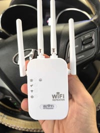 مكرر واي فاي • ٤ أنتينات • ٢ بورت LAN