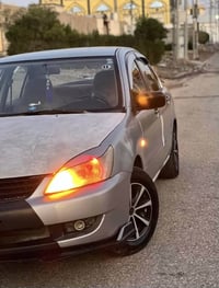 لانسر • ٢٠٠٧ • ٦١٠٠٠٠ كم