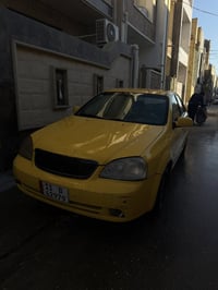 أوبترا 2011 الشركه العامه للسيارات  بيها قبق جنطه تبديل دعاميه  كير نض...