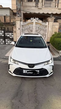 كورلا هايبرد 2025 للبيع على حادثها رقم بغداد تحويل ثاني يوم السيارة شغ...