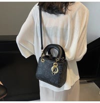 شنطة ديور • نسائية • أسود أبيض وردي