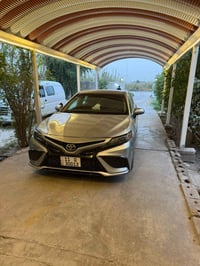 كامري للبيع موديل ٢٣ معوقين وكاله عامه رقم بغداد شبه مميز  حادث خفيف ج...