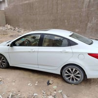 اكسنت خليجي ٢٠١٤ اللون ابيض المحرك ١٦٠٠ دكشن عالي  فتحه بالسقف شاشة تا...